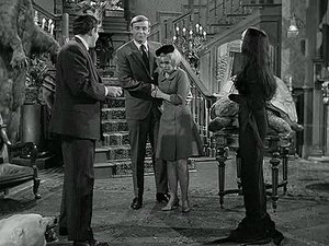 Poster for The New Neighbors Meet the Addams Family