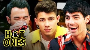 Poster for The Jonas Brothers Burn Up While Eating Spicy Wings