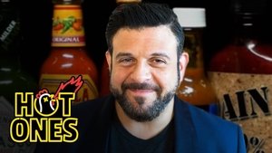 Poster for Adam Richman Impersonates Noel Gallagher While Eating Spicy Wings