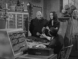 Poster for The Addams Family Splurges