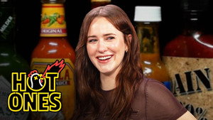 Poster for Rachel Brosnahan Flies Through The Air While Eating Spicy Wings