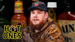 Poster for Luke Combs Feels a Heat Hurricane While Eating Spicy Wings Poster for Luke Combs Feels a Heat Hurricane While Eating Spicy Wings