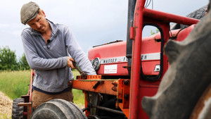 Poster for New tractor and old rakes